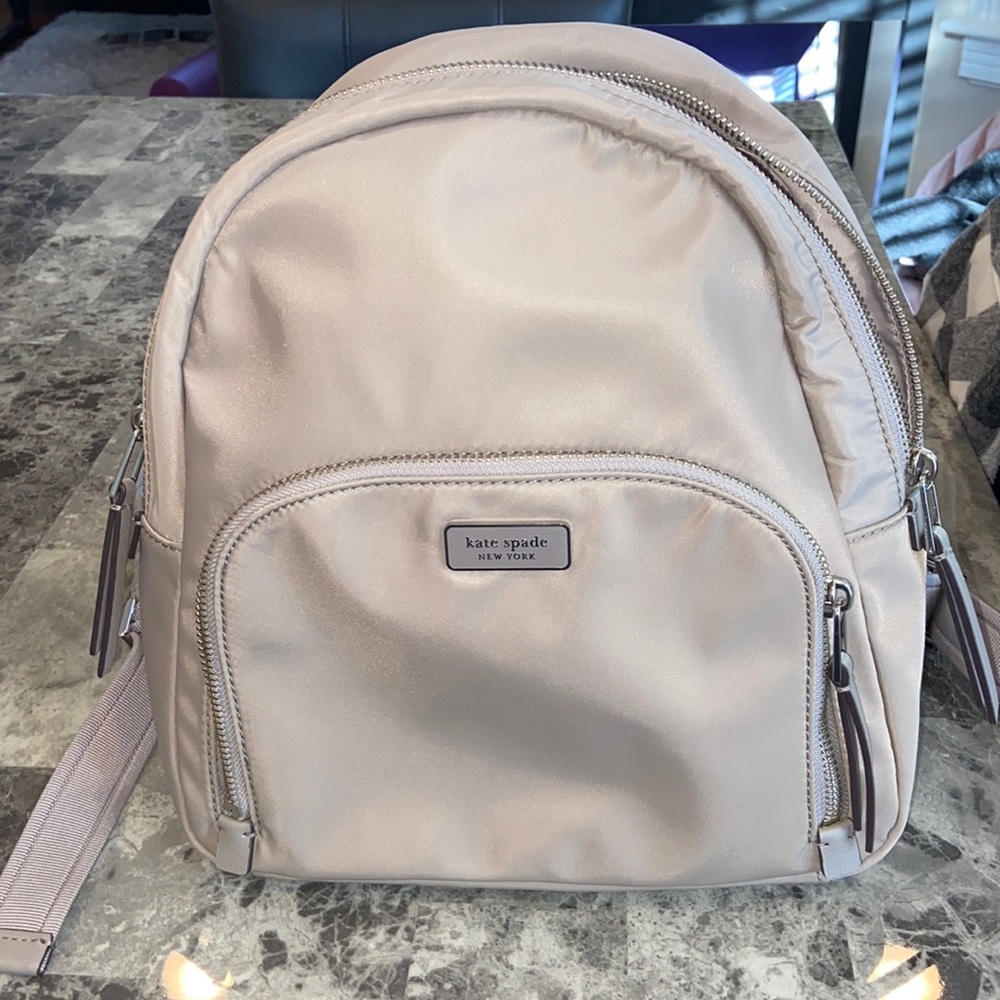 Kate Spade small backpack purse, used one time. Perfect condition!
